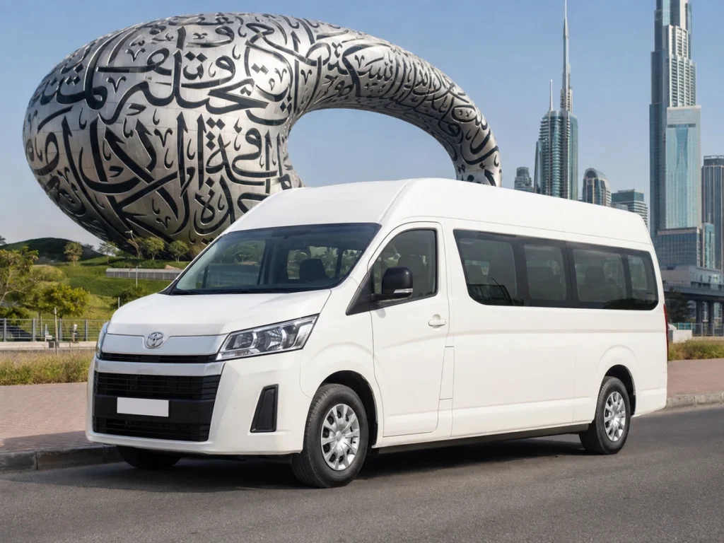 White Toyota minivan with Museum of the Future